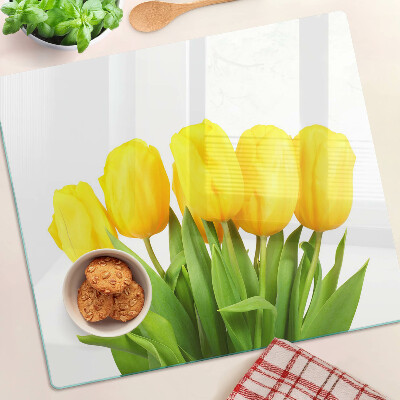 Skærebræt i glas Gule tulipaner på en grøn baggrund