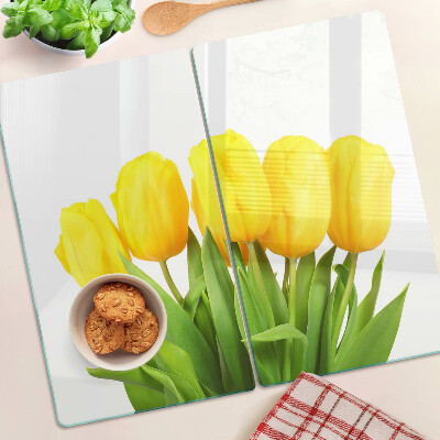 Skærebræt i glas Gule tulipaner på en grøn baggrund
