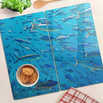 Glas skærebræt En fiskestime i klart vand