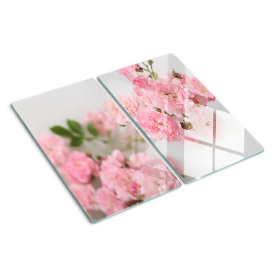 Skærebræt i glas Lyserøde blomster i en vase