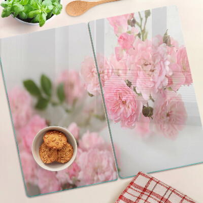 Skærebræt i glas Lyserøde blomster i en vase