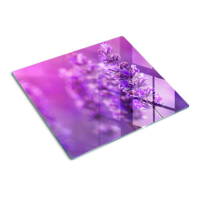 Skærebræt i glas Lavendelblomster på en lilla baggrund