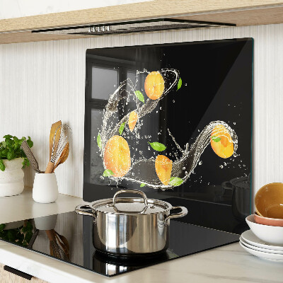 Skærebræt i glas Citrusfrugter i vand
