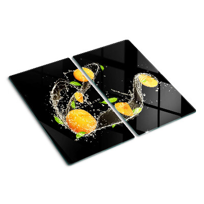Skærebræt i glas Citrusfrugter i vand
