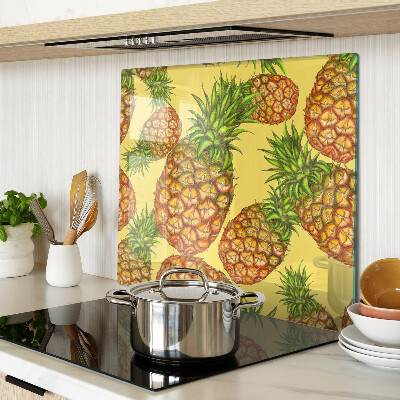 Skærebræt i glas Ananas på en gul baggrund