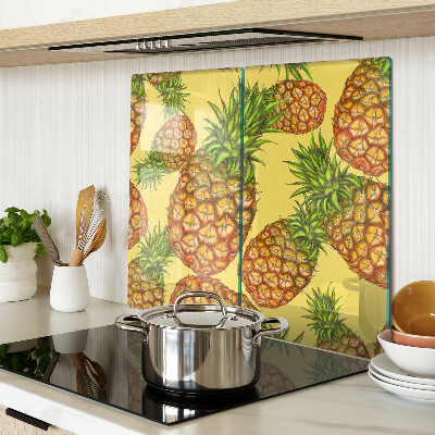Skærebræt i glas Ananas på en gul baggrund