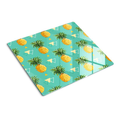 Glas skærebræt Ananas på en turkis baggrund