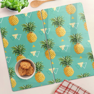 Glas skærebræt Ananas på en turkis baggrund