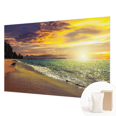 Vlies fototapet med motiv af en strand ved solnedgang