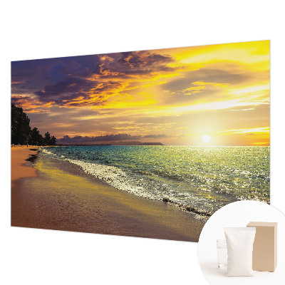 Vlies fototapet med motiv af en strand ved solnedgang