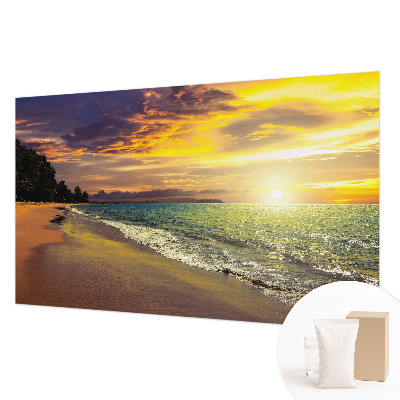 Vlies fototapet med motiv af en strand ved solnedgang