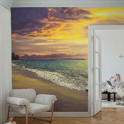 Vlies fototapet med motiv af en strand ved solnedgang