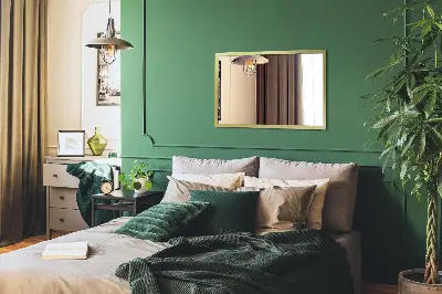 Vægspejl med guldram elegant