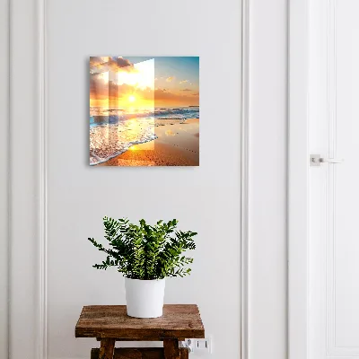Nøgleskab med motiv af solnedgang over havet