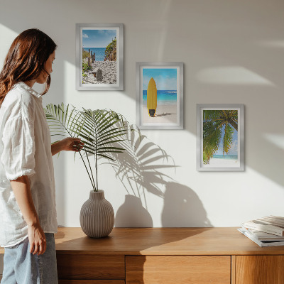 Billedvæg Ferieudsigt over stranden, bølgerne og palmetræerne i troperne