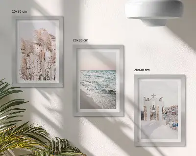 Billedvæg med rammer strandplanter, havbølger og udsigt over hvide huse