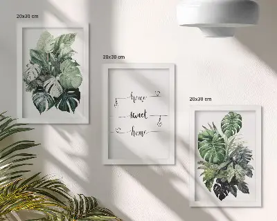 Billedvæg med akvarelmotiv af monsterablade og teksten Home Sweet Home