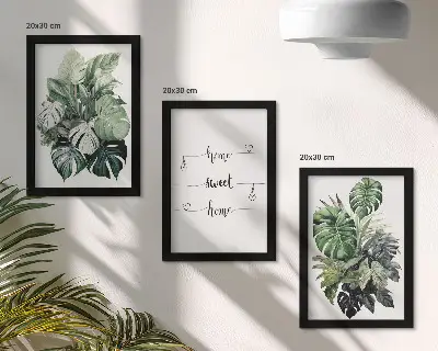 Billedvæg med akvarelmotiv af monsterablade og teksten Home Sweet Home