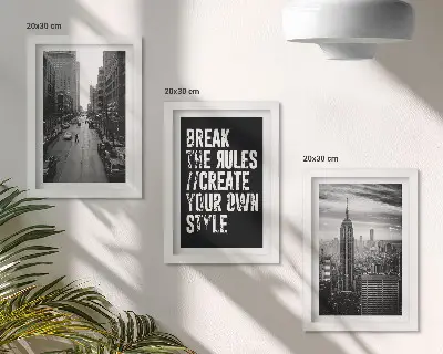 Billedvæg med byens gader i sort-hvid og inspirerende citat