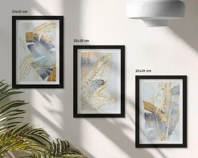 Billedvæg med blade i blå og beige nuancer på lys baggrund