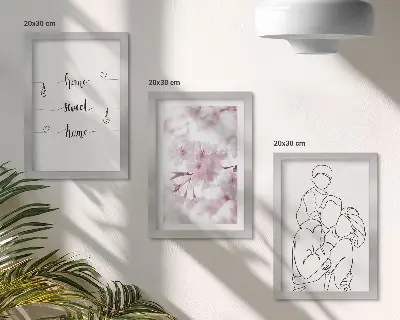 Billedvæg med blomster og familie i minimalistisk design