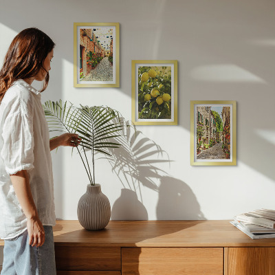 Billedvæg Charmerende gader med blomster og citroner i baggrunden