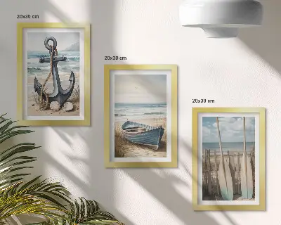 Billedvæg med bådanker og årer på stranden sæt med billeder og rammer