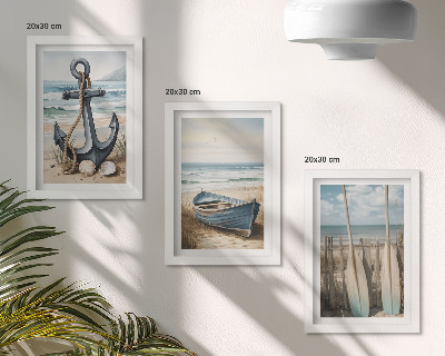 Pakke med billeder og rammer Bådanker og årer på stranden med havet