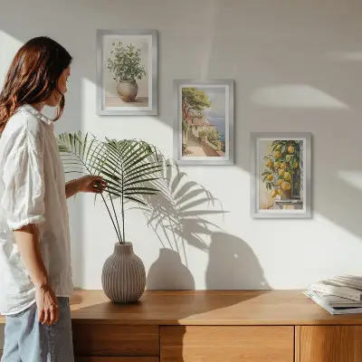 Moderne billedsæt med motiv af blomster i en vase, havudsigt og citroner