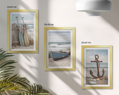 Moderne billedsæt En strand med en robåd og et anker i sandet