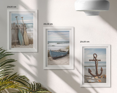 Moderne billedsæt En strand med en robåd og et anker i sandet