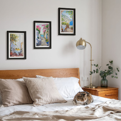 Pakke med billeder og rammer Charmerende gader med blomstrende planter og havudsigt