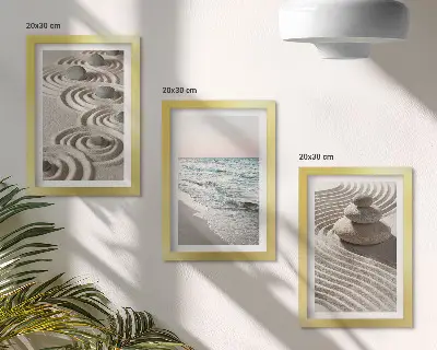 Billedvæg med rolige bølger af sand og vand samt sten på stranden