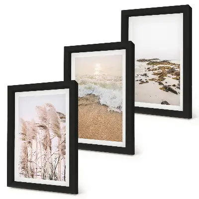 Billedvæg med strandgræs og sten pakke med billeder og rammer i boho-stil