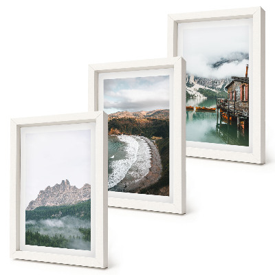 Billedvæg Bjerglandskaber med en strand og et træhus