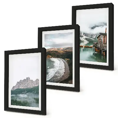 Billedvæg med motiv af bjerglandskaber, strand og træhus
