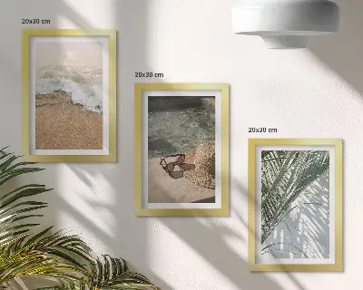 Moderne billedsæt med motiv af strandhat og solbriller på blade