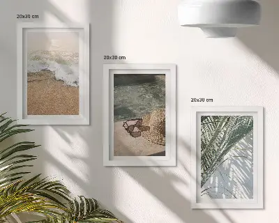 Moderne billedsæt med motiv af strandhat og solbriller på blade