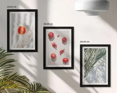 Billedvæg med motiv af tropiske frugter og palmeblade