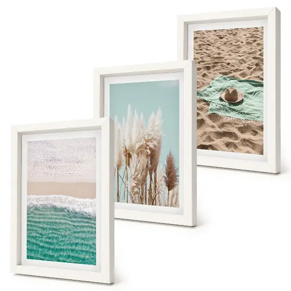 Billedvæg med motiv af strand, bølger, græs, hat, sand og afslappende natur