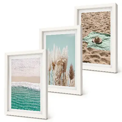 Billedvæg med motiv af strand, bølger, græs, hat, sand og afslappende natur