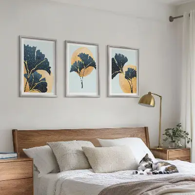 Triptyk med ginkgo blade billeder med lys baggrund og ramme