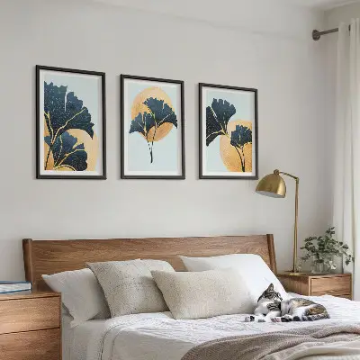 Triptyk med ginkgo blade billeder med lys baggrund og ramme