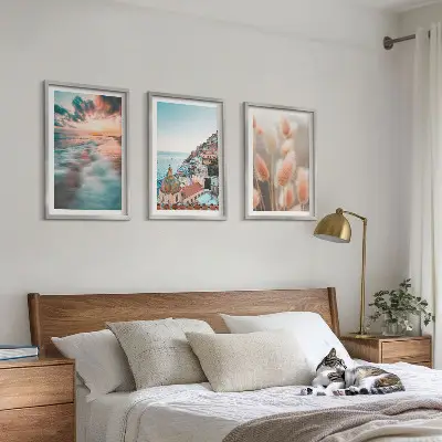 Triptykon med havsolnedgang og blomster inklusive ramme