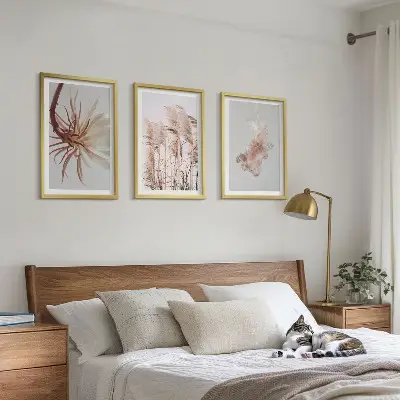 Græsblomster på lys baggrund triptykon med ramme