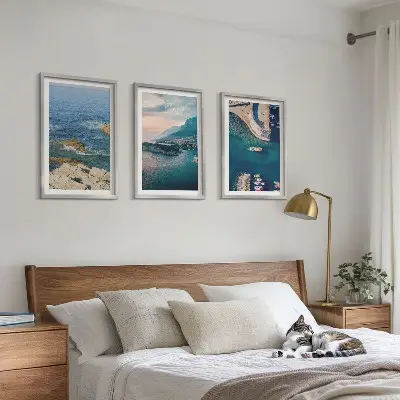 Billedvæg med havudsigt motiver af klipper og havne