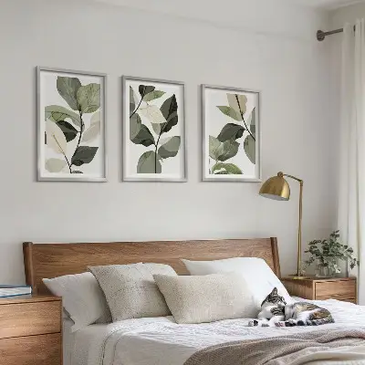Billedsæt til soveværelset med motiv af malede boho planteblade