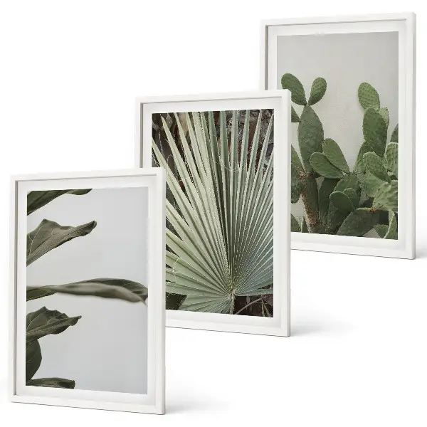 Billedsæt til soveværelset med blade af tropiske planter i pastel