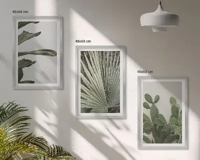 Billedsæt til soveværelset med blade af tropiske planter i pastel