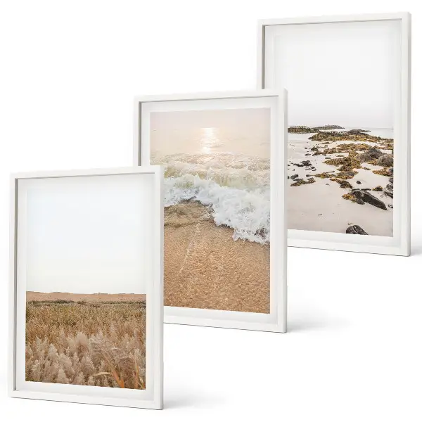 Triptykon med strandbølger og sten med ramme i sommertema